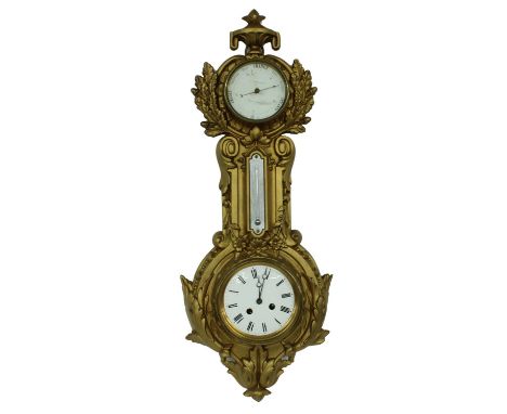 Gilt metal cased clock barometer and thermometer, the two train clock movement striking on a bell and the 3.5" white baromete