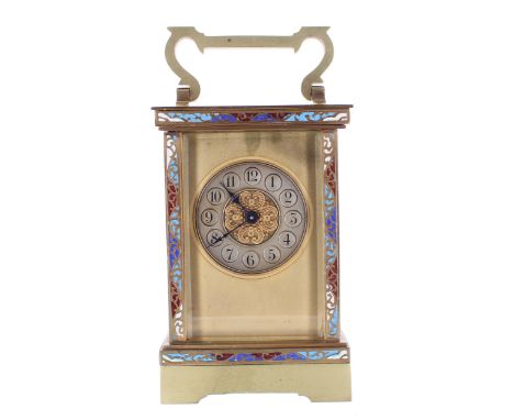 Attractive&nbsp;carriage clock timepiece, the 1.75" silvered chapter ring enclosing a filigree centre, within a gilt mask and