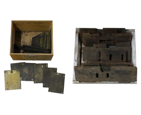 Fourteen various wooden longcase and other seat boards; also a box of brass movement plates and false plates 