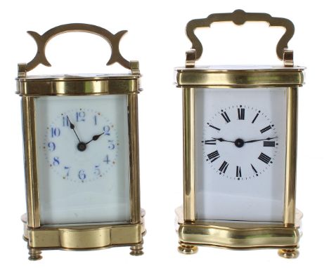 Two carriage clock timepieces, both within doucine brass cases, 6" high (keys) 