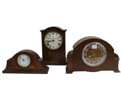 American mahogany inlaid two train mantel clock striking on a gong, the 5.25" cream dial inscribed WM.L. Gilbert Clock Co., W