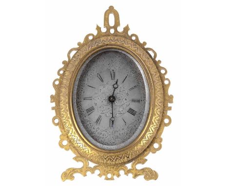 Good small English ormolu oval easel clock&nbsp;timepiece in the manner of Thomas Cole, the silvered dial finely engraved wit