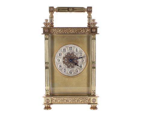 French&nbsp;carriage clock timepiece, the 1.75" silvered chapter ring enclosing a filigree centre and within a gilt mask and 