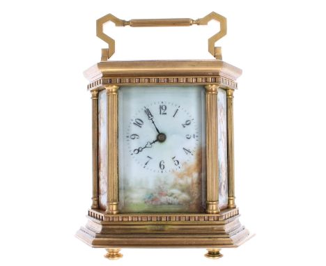 Contemporary porcelain panelled&nbsp;carriage clock, within an hexagonal case painted with a floral landscape scene on the di