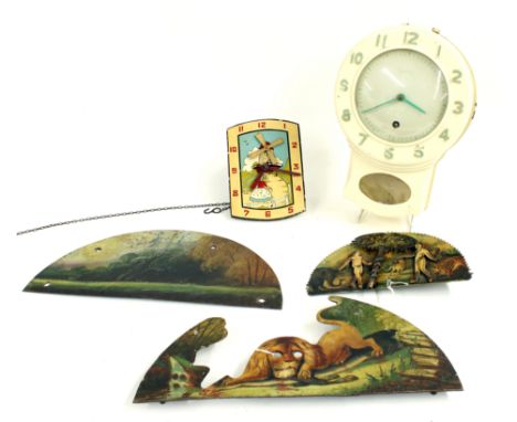 Adam and Eve painted clock arch automata and a two part longcase clock painted arch depicting a lion with prey before a woode