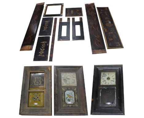 Quantity of red and black lacquer chinoiserie panels from a longcase clock; also three very distressed American ogee wall clo