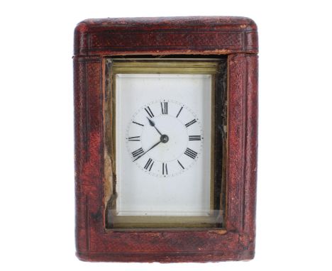 French&nbsp;carriage clock striking on a gong, the movement back plate and base plate stamped no. 8042, within a corniche bra