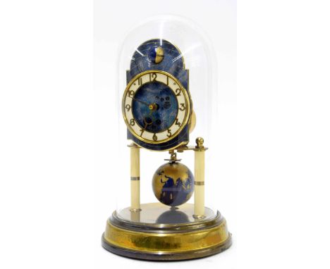 Kaiser Universe torsion clock circa 1954, the 3" white chapter ring enclosing a recessed celestial centre under a rounded arc