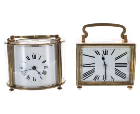 French carriage clock timepiece, within an oval case, 4.75" high; also another carriage clock timepiece within a rectangular 