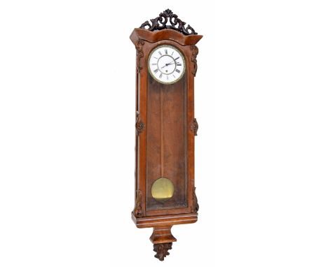 Good light walnut Viennese month going regulator wall clock, the 6.5" dial enclosing a recessed centre, within a glazed case 