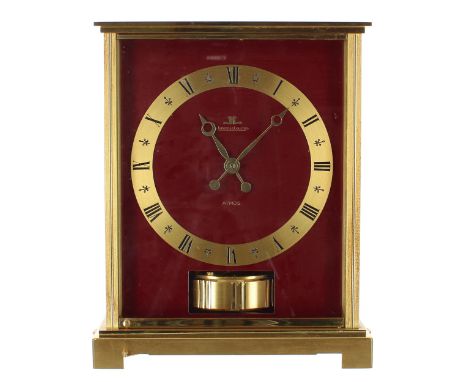 Jaeger-LeCoultre Embassy Model Atmos clock, the 5.25" gilt chapter ring fixed to a dark red dial plate, within a brushed bras