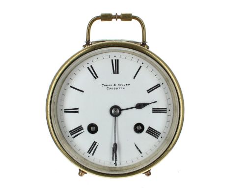 Two chain drumhead mantel clock striking on a bell, the 3.75" white dial signed Cooke &amp; Kelbey, Calcutta, within a brass 