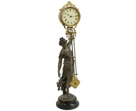 Spelter Mystery mantel clock, modelled as a classical robed lady holding aloft the clock with 3.5" cream dial within a drumhe