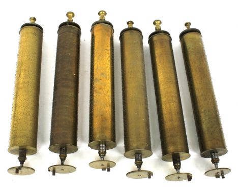 Six interchangeable musical box cylinders, each playing on four airs with one hundred and twenty notes, 13" long, in good con