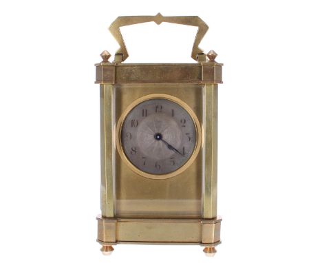 Carriage clock timepiece, the 1.75" silvered chapter ring enclosing an engine turned centre and within a gilt mask and pillar