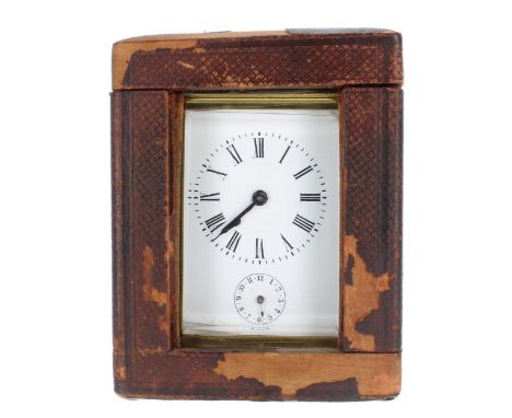 Carriage clock timepiece with alarm, fitted with a bell beneath the base, within a corniche brass case, 5.75" high (winding k