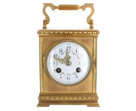 French gilt metal small two train carriage type mantel clock, the movement with platform escapement striking on a gong, the 3
