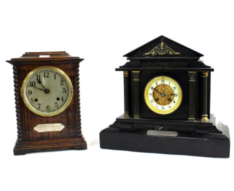 French black slate and brass mounted two train mantel clock, the 3.75" cream chapter ring enclosing a recessed gilded centre,
