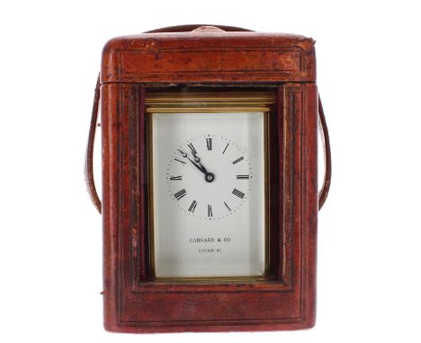 Carriage clock timepiece, signed Garrard &amp; Co, London W1 on the dial plate below the chapter ring, within a corniche bras