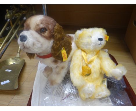 A small modern Steiff together with a modern Steiff spaniel dog