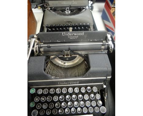 A vintage cased Underwood typewriter together with a similar vintage Remington Rand cased typewriter