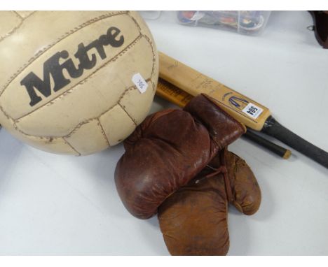 A pair of vintage leather child's boxing gloves, stamped Eton, together with a miniature model Richie Benaud autograph cricke