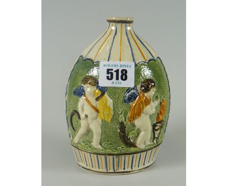An early nineteenth century polychrome Pratt ware pottery flask moulded with harvesting angels to either side
