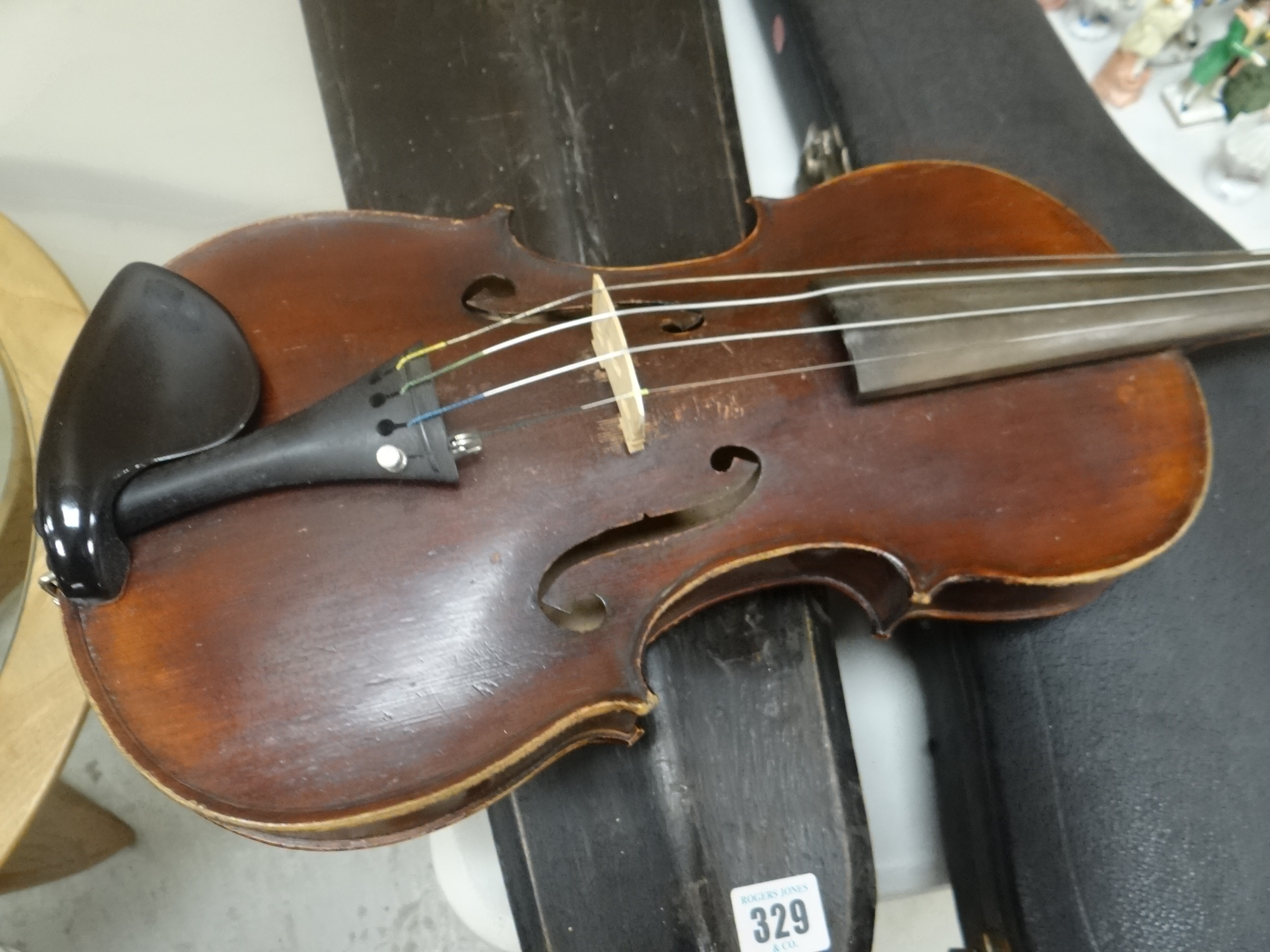 Two cased vintage violins