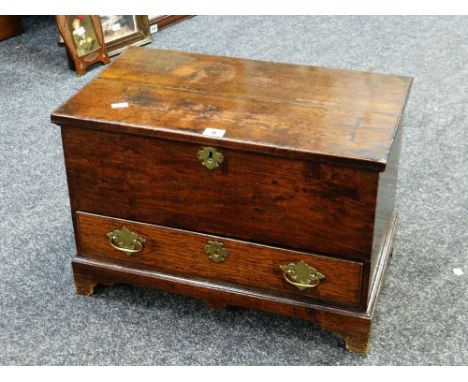 An antique nineteenth century Welsh oak coffer-bach chest with single drawer on bracket feet and with brass mounts, 54cms wid