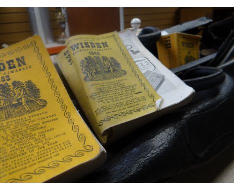 A vintage W W Bridge leather cricket bag together with a collection of Wisden Almanacks ETC