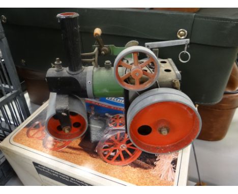 A boxed Mamod steam tractor
