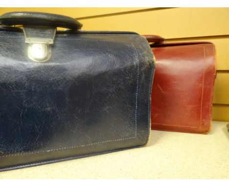 Two vintage leather overnight / travel cases