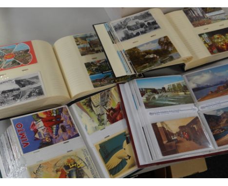 Four albums of vintage topographical postcards