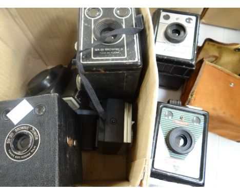 Collection of vintage cameras including a Coronet console, a Coronet ambassador, a Kodak Brownie Six-20 ETC