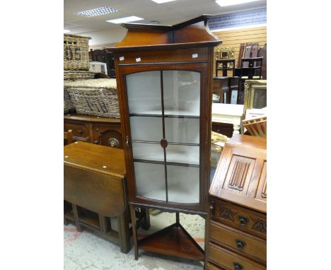 A neat mahogany and inlaid standing corner cabinet with railback, glazed upper door and bottom shelf