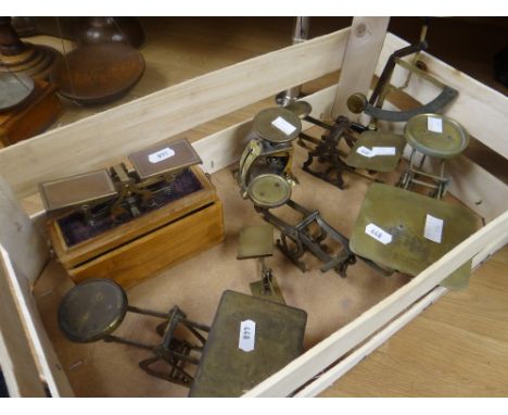 A collection of eight vintage brass postal scales