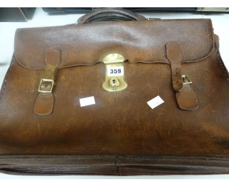 A good vintage tan leather soft briefcase
