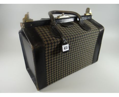 A vintage rigid Parfums Rochas Paris twin-handled overnight bag with matching purse inside
