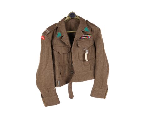 A WWII Polish army BD jacket, with titles, rank pocket badge and ribbons for Monte Cassino. £70-100 