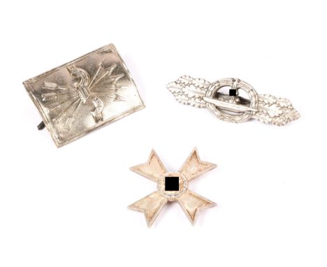 A Third Reich War Merit cross, 1st class without swords; a cast silver U boat badge by Schwerin; and a thin white metal Spani