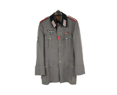 A good quality replica Third Reich army officer's service dress jacket, Mountain Troop Edelweiss arm badge etc. GC £30-40 