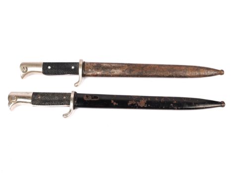 A Third Reich parade bayonet, plated blade 9¾", by E.u.F. Horster, Solingen, in its black painted scabbard GC (scabbard paint