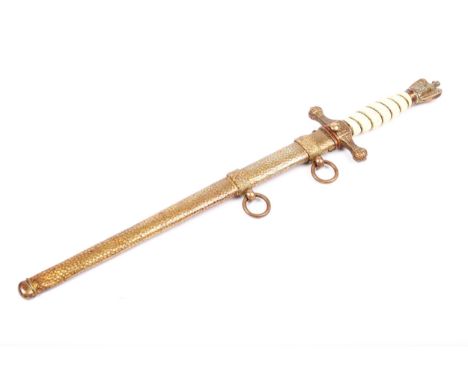 A Third Reich naval officer's dagger, the un-named blade etched with fouled anchors and entwined dolphins, with wire bound gr