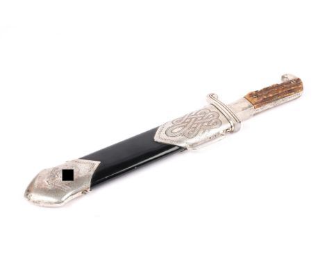 A Third Reich RAD subordinate's hewer by Eickhorn, in its scabbard. Basically GC (grinding marks to the blade, the hilt and s