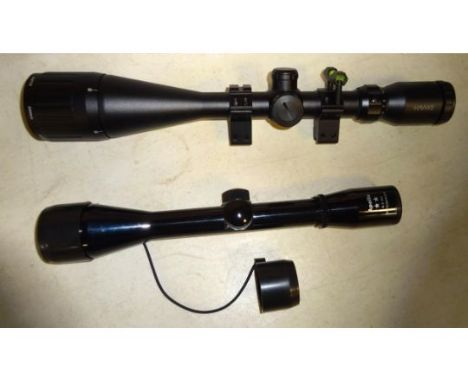 A good Eclipse "Hawk" 4-16x50 telescopic rifle sight, with barrel clamps. New Condition, in its original box with "Red dot" l