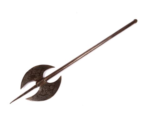 An Indo Persian all steel axe, the double crescent head etched overall with panels of foliage, on 27½" haft which includes 4½