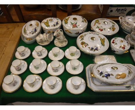 A collection of Royal Worcester "Evesham" pattern tureens, covers and serving dishes, together with a set of twelve Royal Wor