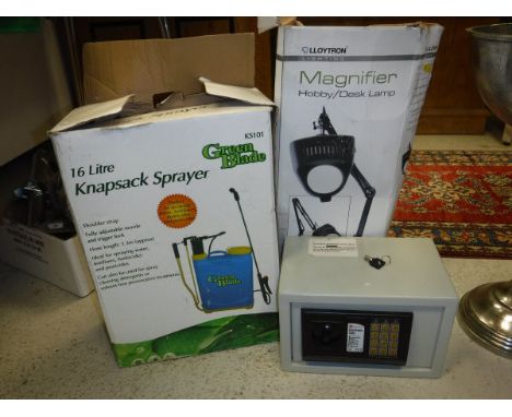 A Kingavon electronic safe, a Lloytron magnifier desk lamp and a Green Blade knapsack sprayer*