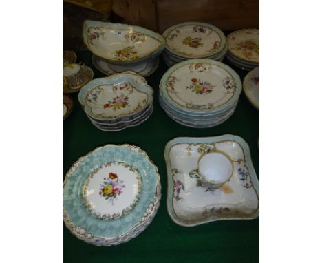 A 19th Century Continental hand-painted and gilt decorated dessert service with basket weave edging, together with a capodimo