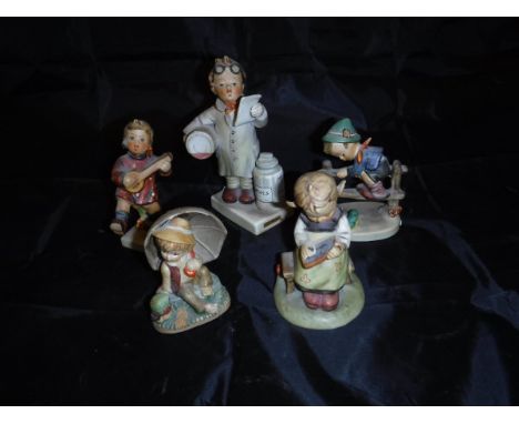 A collection of four Goebel Hummel figures, together with a similar Sitzendorf figure